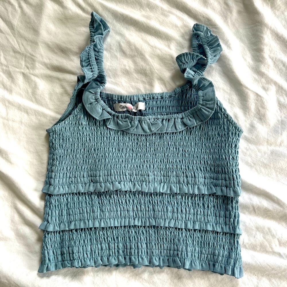 Blue smocked and ruffled crop top